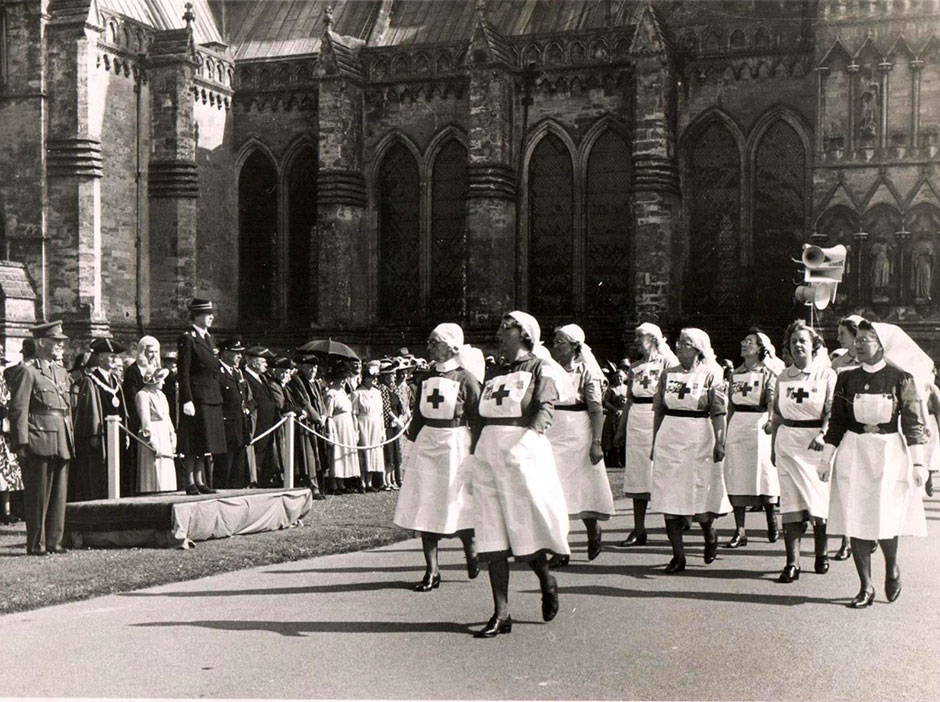 Rosalie leads a parade for the Red Cross