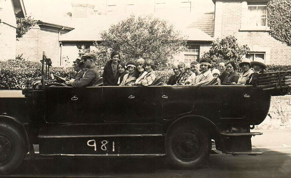 A contemporary view of a charabanc, with Helen Barton/Kegie in the back seat with her parents.